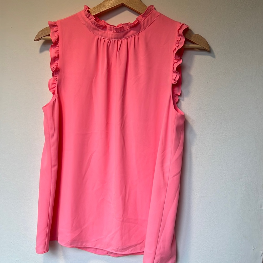 Bright pink Lilly Pulitzer ruffle top